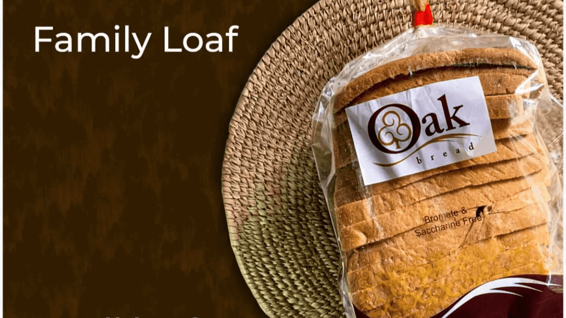 A large, thick-sliced family loaf of bread from Oak Bread (Old English) in Gwarimpa.
