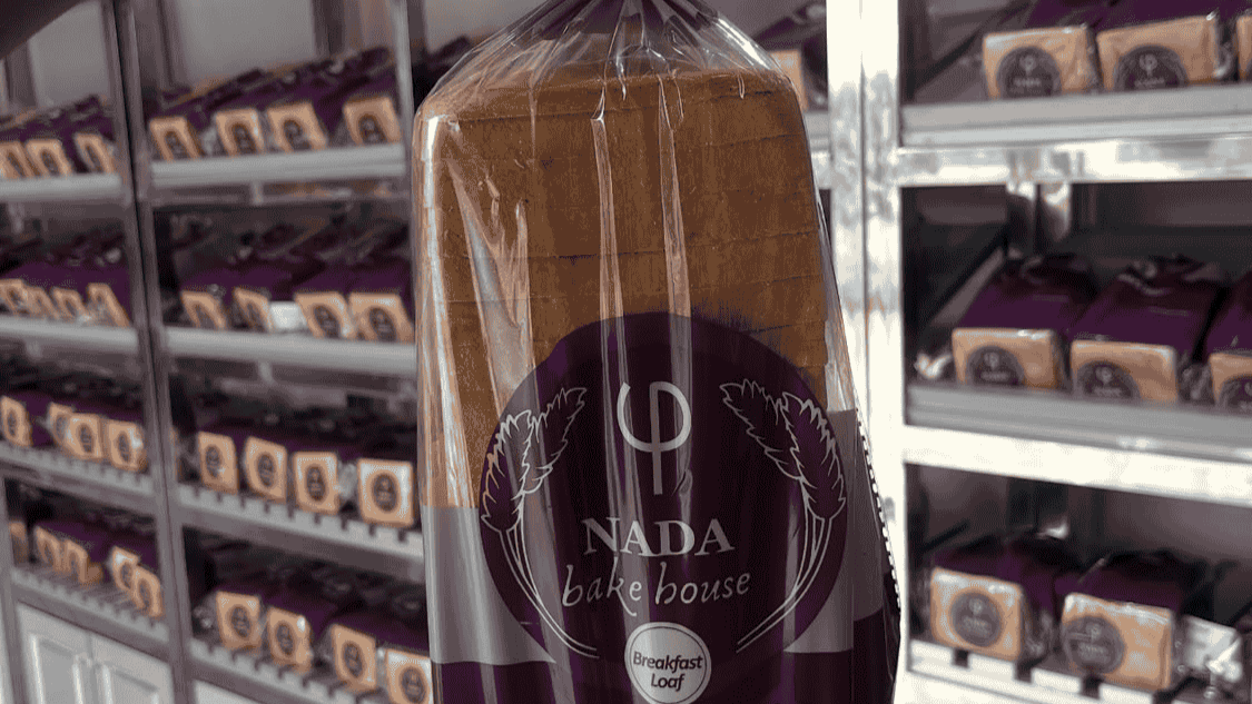 Freshly baked artisanal pastries wrapped in eco-friendly brown paper bags at Nada Bake House, Wuse 2.